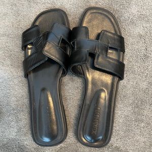 Black leather flat sandal
